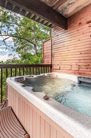 Our wonderful, new hot tub looking out into the Great Smokies!
