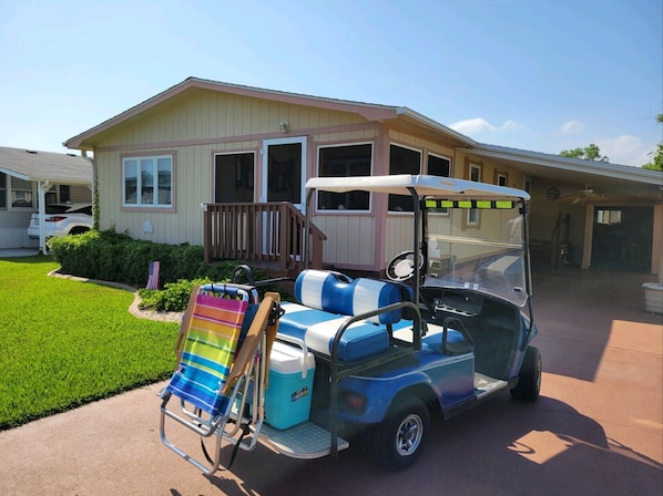 Included Golf Cart For The Short Trip To The Beach