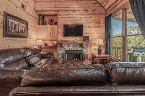 Our big comfy, leather couches are the perfect place to unwind and watch a movie at the end of a long day in Pigeon Forge, Dollywood or up in the Mountains!