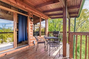 Our outdoor deck is another highlight of the cabin - whether it is the grill, enjoying a morning coffee at the table or taking in the nature with a soak in the hot tub - we love this spot!