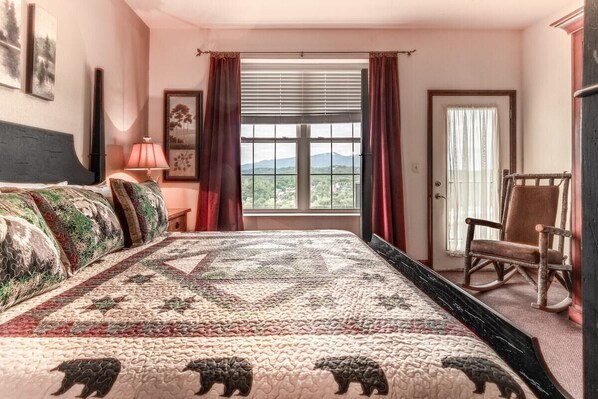 Our spacious master suite with views of the Great Smoky Mountains as the perfect backdrop.  Want to check them out even closer?  Take a walk out to the deck or hop in the car and go just a few miles up the road!