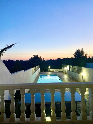 Pool, dining & lounger area. Taken from the lower terrace with direct access