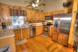 Spacious kitchen with stainless steel appliances