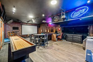 You'll love spending time in "The Lounge" with karaoke and a large projector screen TV