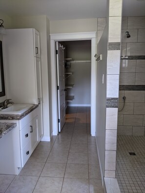 Main bedroom ensuite bathroom features double sinks and a huge walk-in closet.