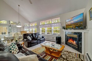 Living room with comfortable leather recliners and couch - Serhii Vacation Rentals
