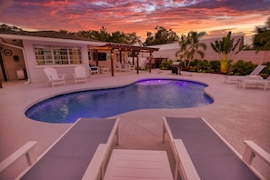 The pool and surrounding area features enough lighting to enjoy the Florida evenings in style!