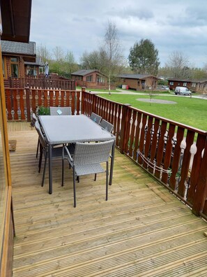 Decking area with chairs and table