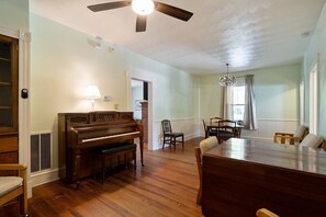 Hardwood, Flooring, Ceiling Fan, Floor, Chair