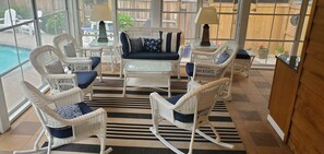 A beautiful three-season room for morning coffee or evening nightcaps...