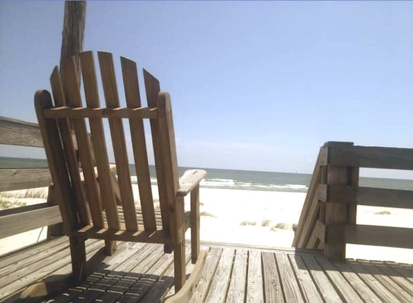 Take a seat and enjoy the view at House of Joy!  Beachfront at its best.