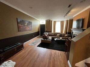 View of family room and front door from dining room