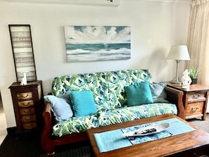 Futon makes into a bed. The coffee table is a lift top for more dining space.