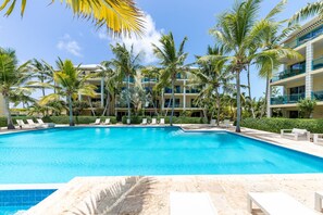 Condo D4, ground floor, pool side, walk out to boardwalk, marina, dining, beach