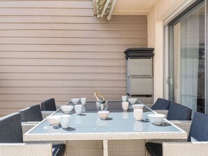 Water, Table, Tableware, Property, Sky, Furniture, Building, Window, Blue, Chair