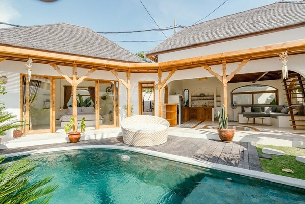 View of the villa's front and pool area 