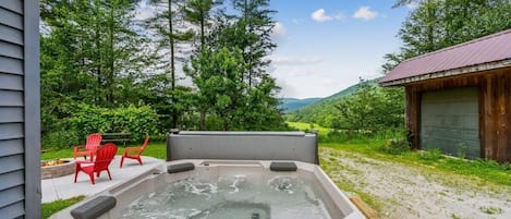 Enjoy the beautiful view while taking a dip in the hot tub!