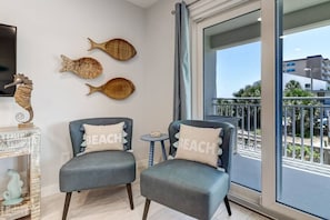 Living room | Sliding doors that open to oceanview deck