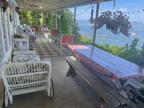 Expansive porch captures views of the Port Jefferson Harbor

