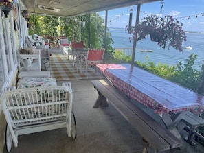 Expansive porch captures views of the Port Jefferson Harbor
