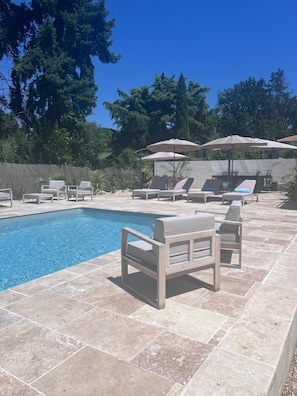 Pool and terrace with outdoor kitchen