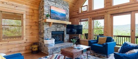 Open concept modern living room with mountain views