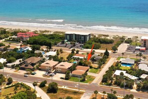 500 feet to the sand at an uncrowded beach. Just one street to cross.