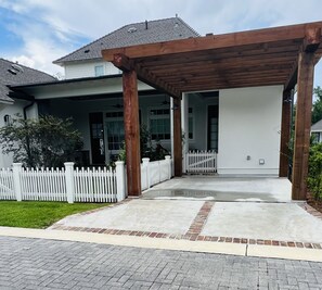 Reserved parking under the trellis.  