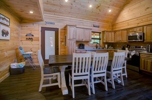 Spacious kitchen with farmhouse table with seating for 8. 