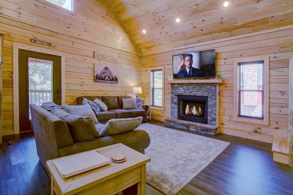 Beautiful living area with gas fireplace and flat screen HDTV