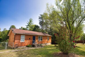 Surrounded by forest with a large driveway big enough for a 5th-wheel. 