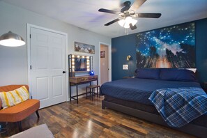 The master has a king, reading nook, closet, en suite bathroom, and fun lights