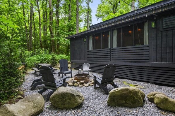The outdoor area built for camp fires.