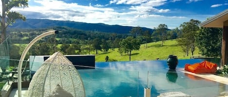 Pool view sunlounge area
