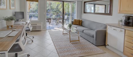 Bright and airy Living Area with two new desks and office chairs!