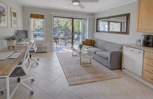 Bright and airy Living Area with two new desks and office chairs!