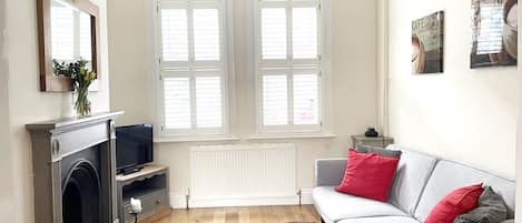 Living room, featuring a comfortable double sofa bed and smart tv