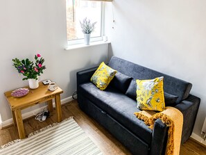 Living room, leading off the kitchen