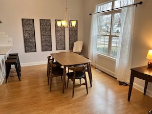 Dining area off kitchen and living room - open concept