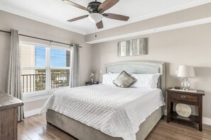 Master bedroom is well decorated and has a new King mattress, 42" Smart TV, closet, and updated bathroom with granite countertops, dual vanity, and walk in shower