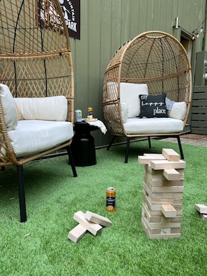 private outdoor patio with plenty of outdoor games.
