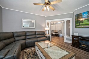 Spacious Living Room with Ceiling Fan