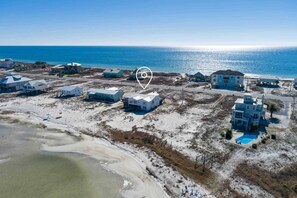 Enjoy the best of both worlds! This unique 2-for-1 home offers direct access to a peaceful lagoon with a private beach, plus easy access to the Gulf. Your perfect getaway for waterfront relaxation and adventure