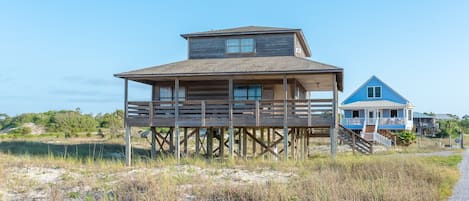 2nd tier beach home with wrap around porch on private gated road