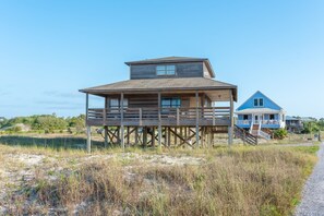 2nd tier beach home with wrap around porch on private gated road