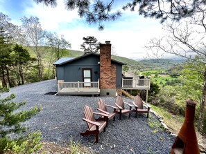 Chiminea fire pit and Adirondack chairs