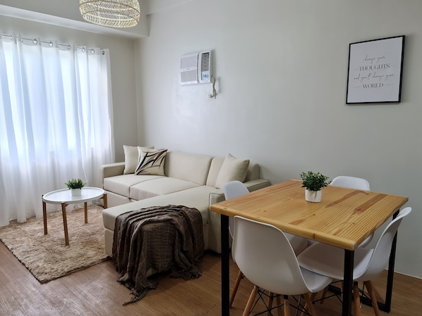 Fully air- conditioned living room and dining area.