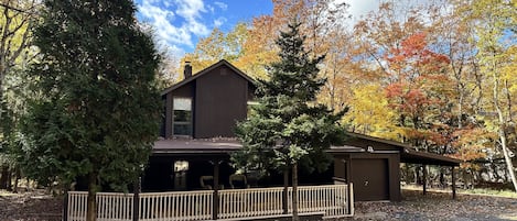 Front of the house with fall foliage