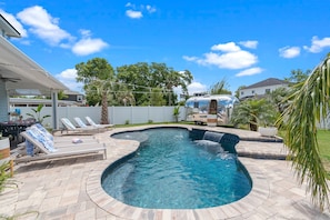 Heated pool with waterfall