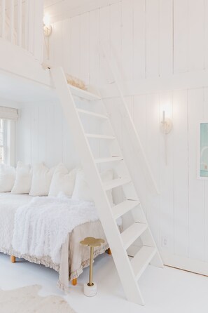 Second floor loft stairs/ladder to double bed sleeping area.